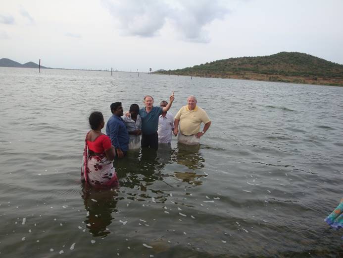 Evangelical baptizing a couple in India