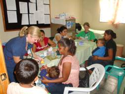 Nurse meeting physical and spiritual needs in Zapotillo