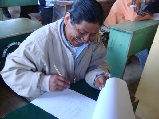 Student taking exam Pallatanga, Ecuador
